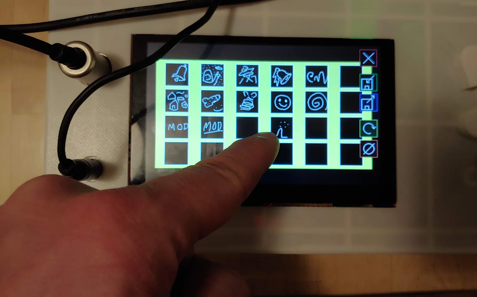 An early prototype treated saved sounds as slots in a grid, personalised by drawing directly onto them.