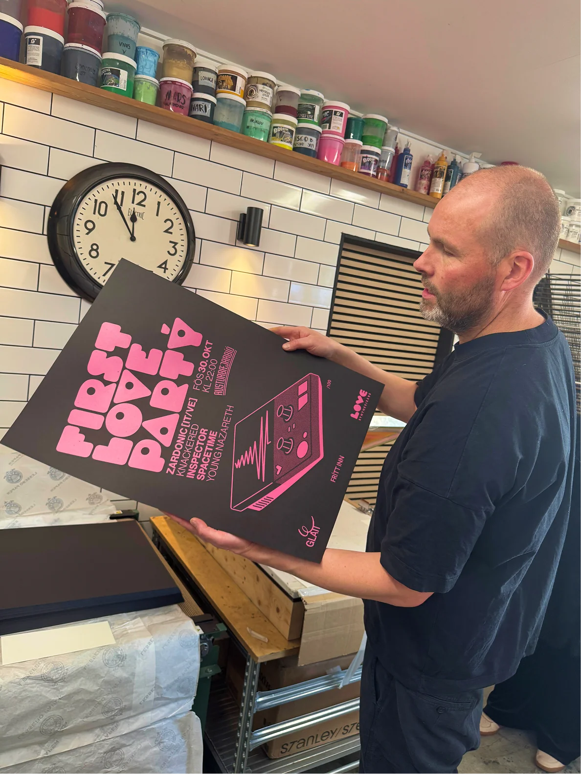 The finished FIRST LOVE Party silkscreen poster held in the Farvi print studio.